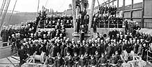 Photo # NH 103265: USS Siboney's officers and crew on deck, at Hoboken, N.J., circa 1-8 February 1919