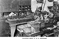 Photo # NH 106322:  Machine shop on USS Antigone