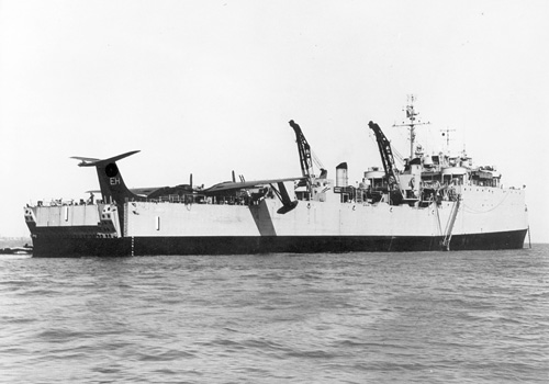 USS Ashland (LSD 1) on 10 April 1957 experimenting with a P5M-2 seaplane in her well dock.